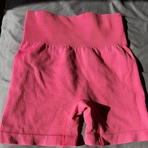 This is a bright pink athletic spandex
